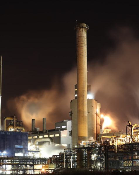 Brown and White Factory Building during Night Time